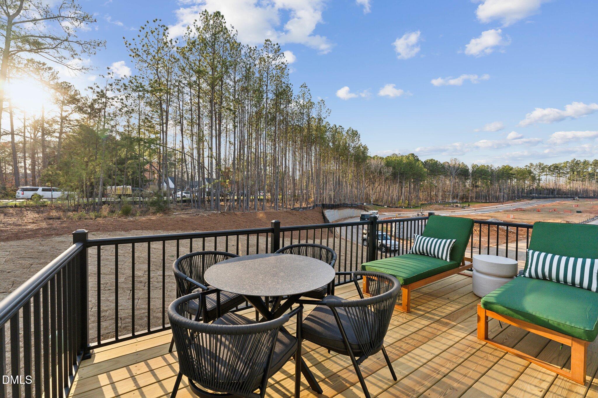 10632 Pleasant Branch Drive Raleigh, NC 27614 - Photo 10 of 35 a view of a chairs and table in the patio