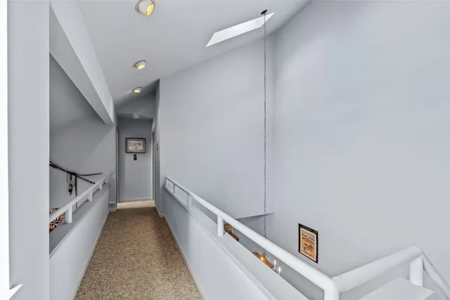 a view of a hallway with entryway