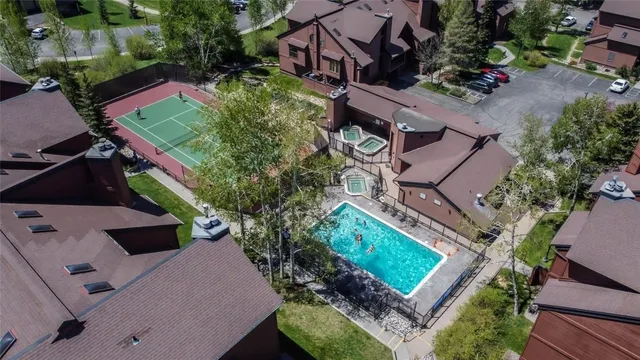 an aerial view of a house with a garden