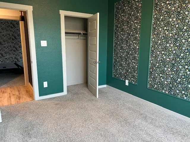 a view of a room that has a window in it