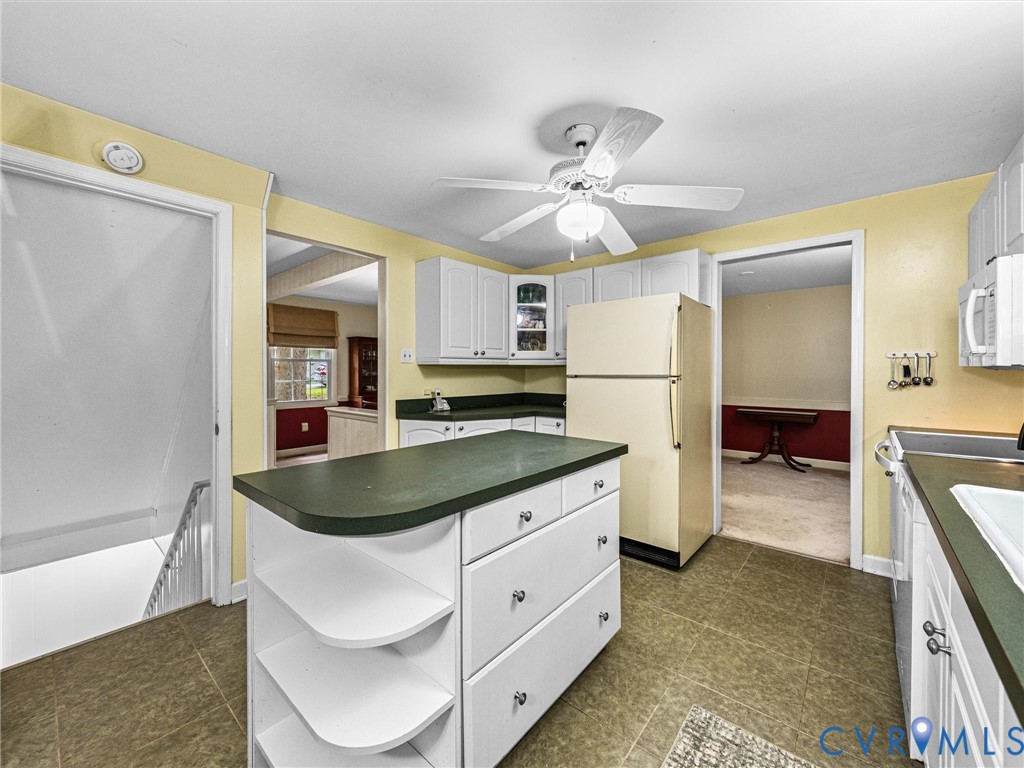 112 Chasnell Road North Chesterfield, VA 23236 - Photo 25 of 49 Kitchen featuring white cabinetry, dark countertop