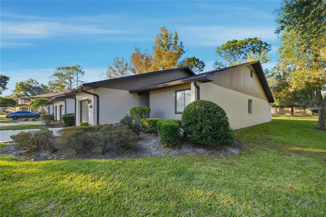 a view of a house with a garden