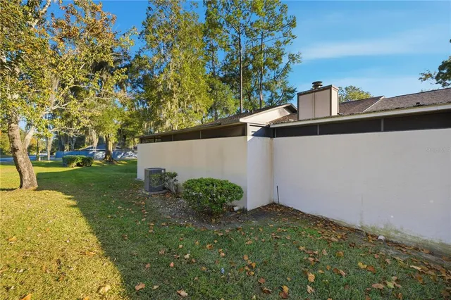 a backyard of a house with lots of green space