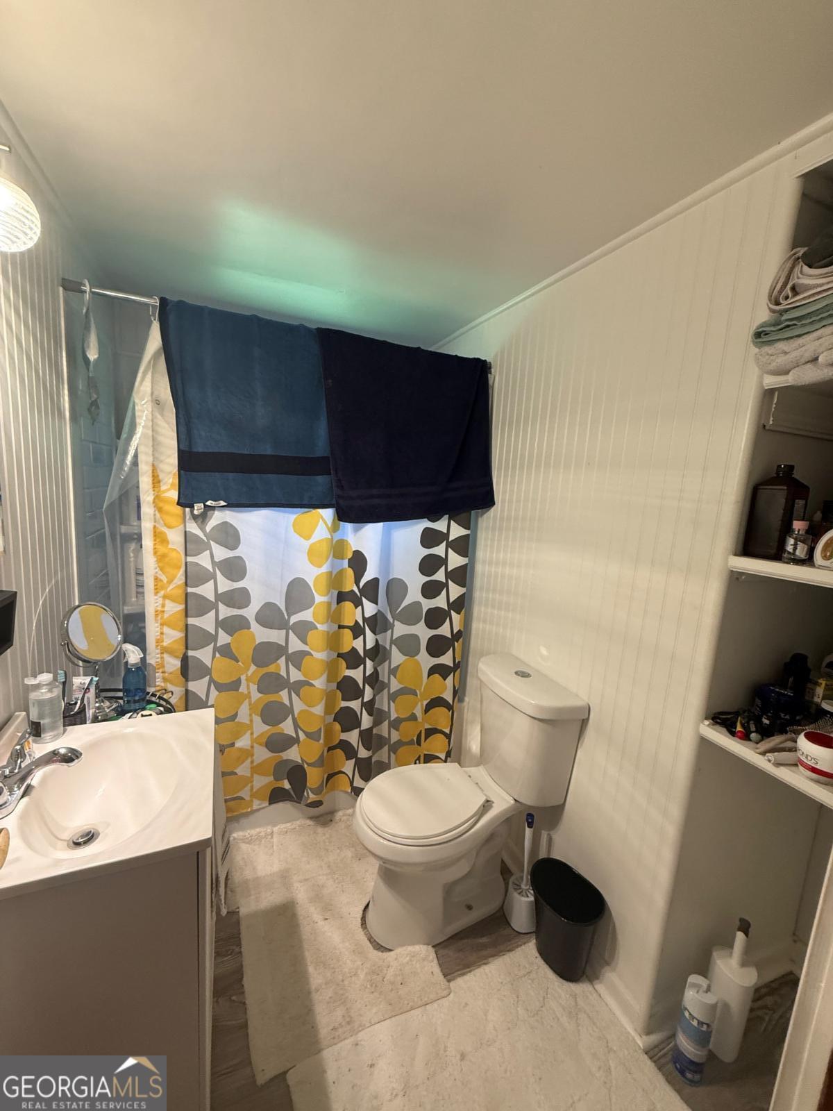 4510 Browns Bridge Road Gainesville, GA 30504 - Photo 13 of 13 a bathroom with a sink toilet and shower