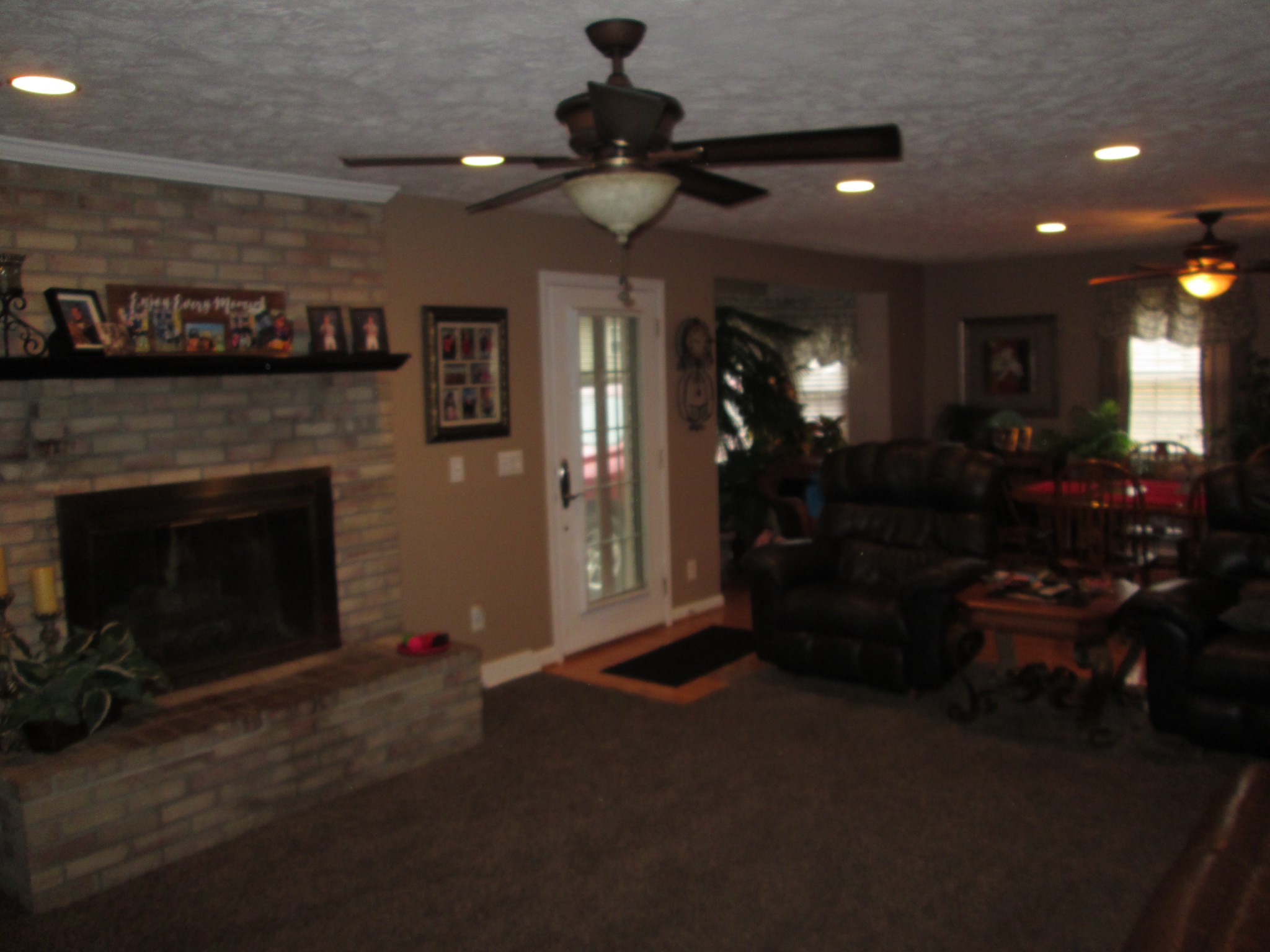 655 Philadelphia Road Lebanon, TN 37087 - Photo 6 of 20 a living room with furniture and a fireplace
