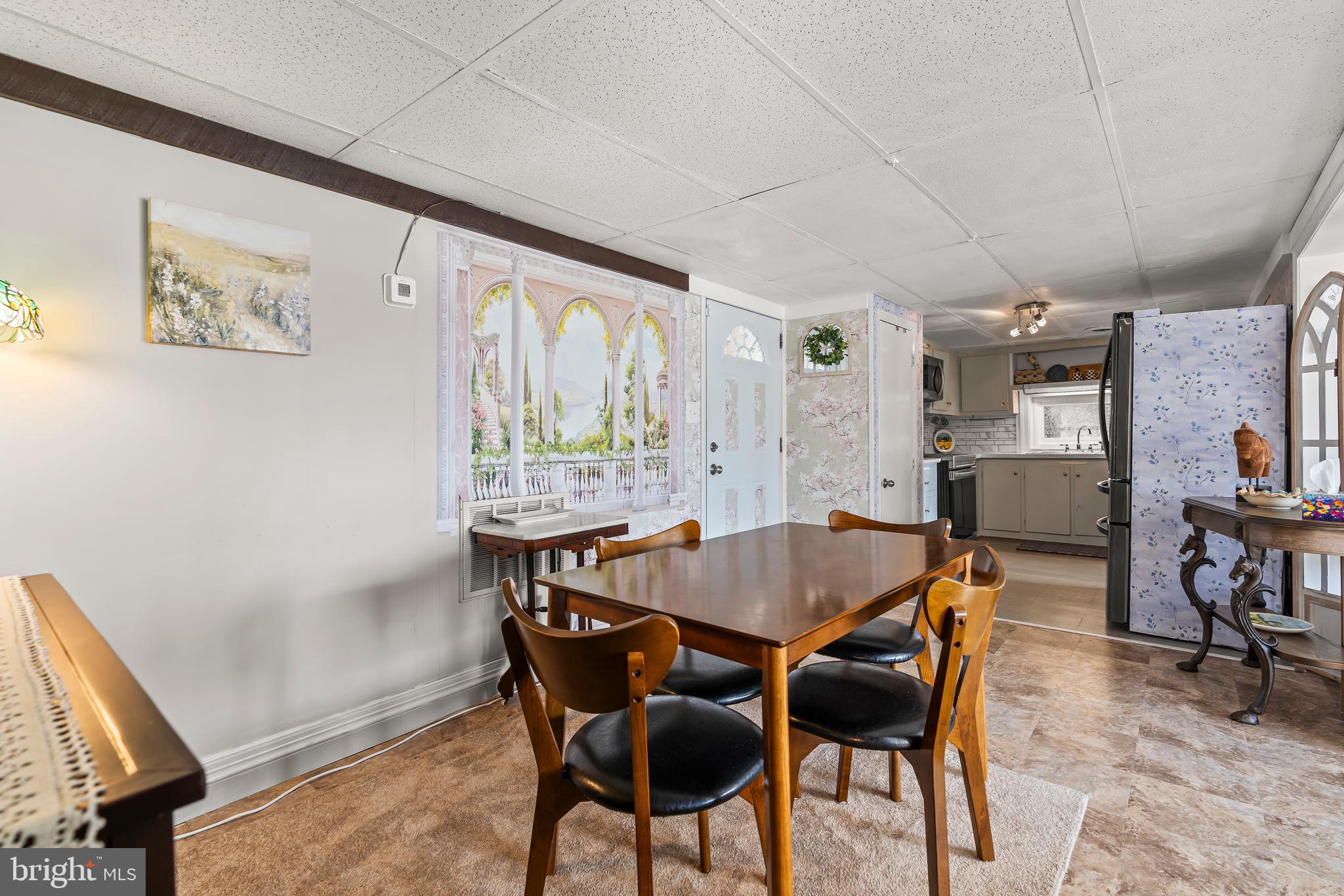 9437 Masters Road Waynesboro, PA 17268 - Photo 15 of 39 a view of a dining room with furniture and a table