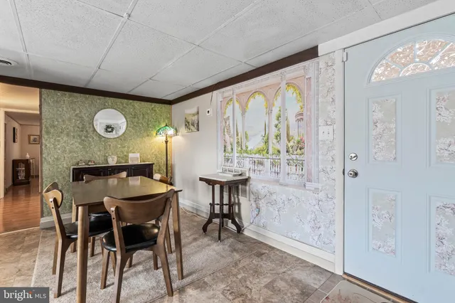 a kitchen with a refrigerator stove and sink