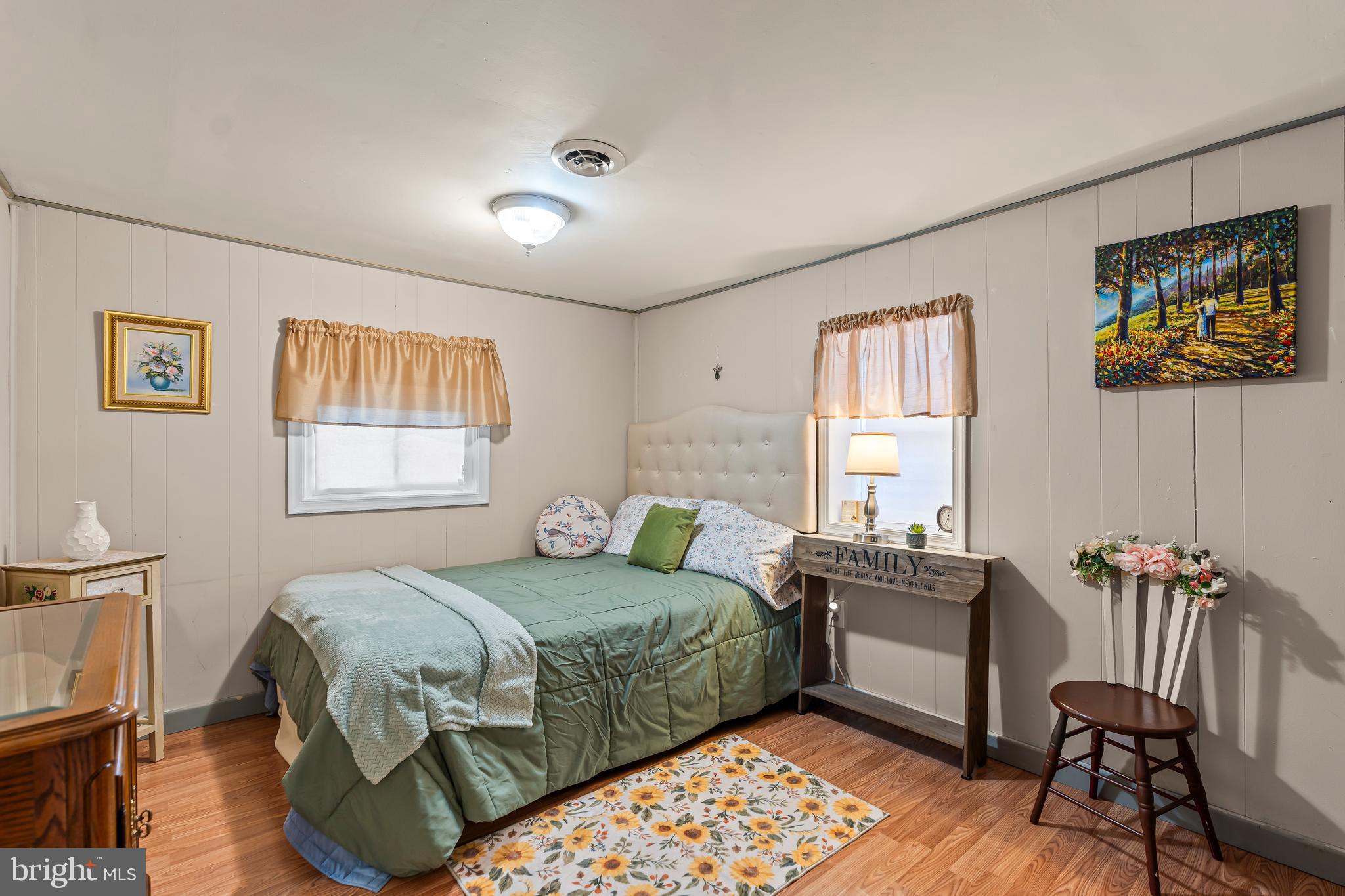 9437 Masters Road Waynesboro, PA 17268 - Photo 31 of 39 a bedroom with a bed and wooden floor