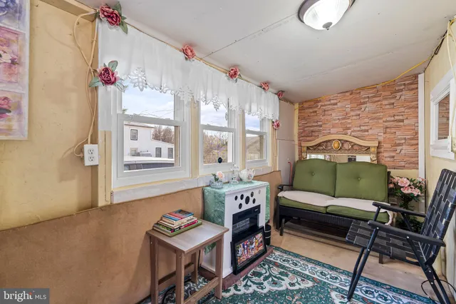 a view of a house with a yard and garage