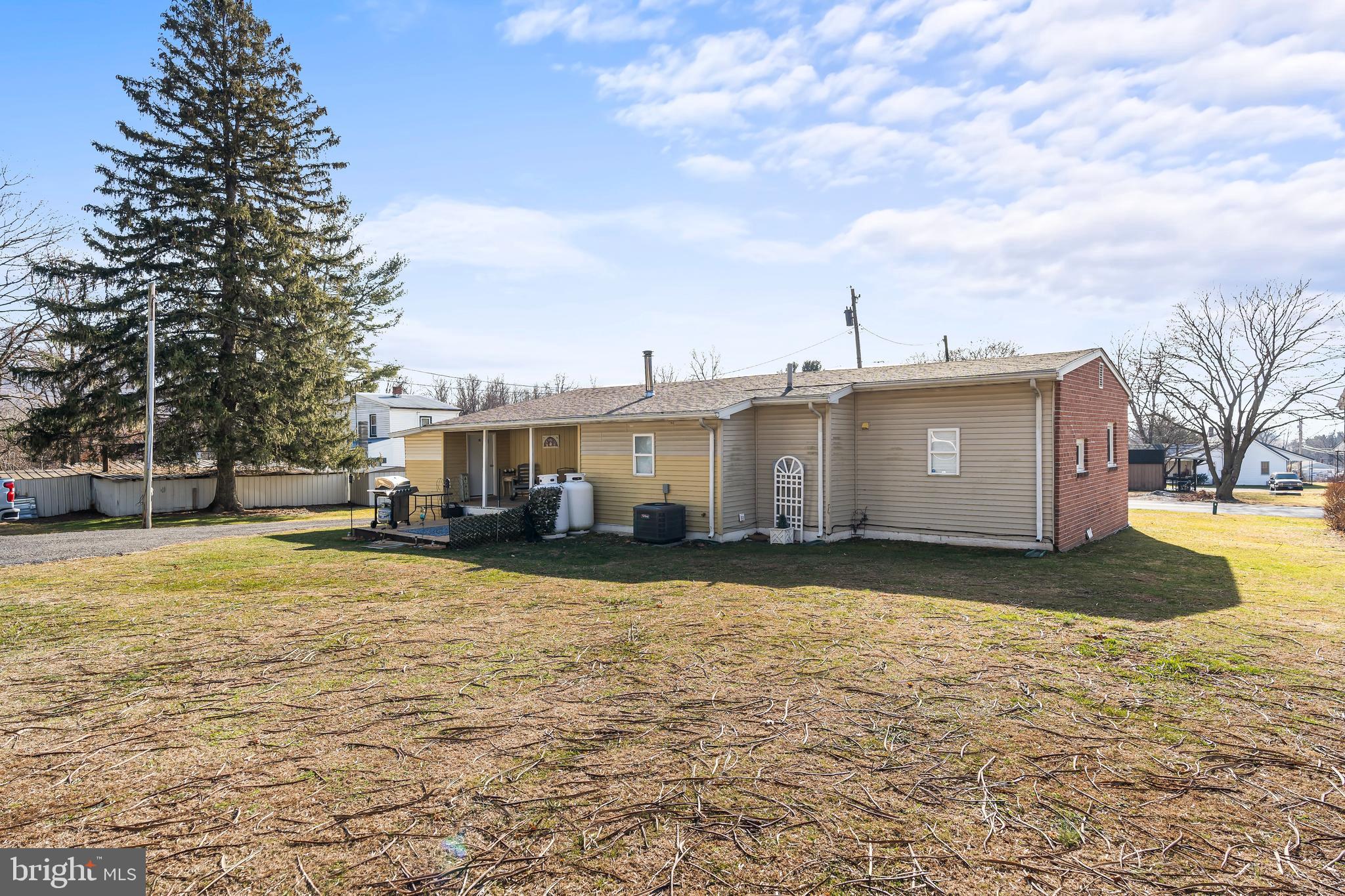 9437 Masters Road Waynesboro, PA 17268 - Photo 35 of 39 a view of a house with a yard and garage