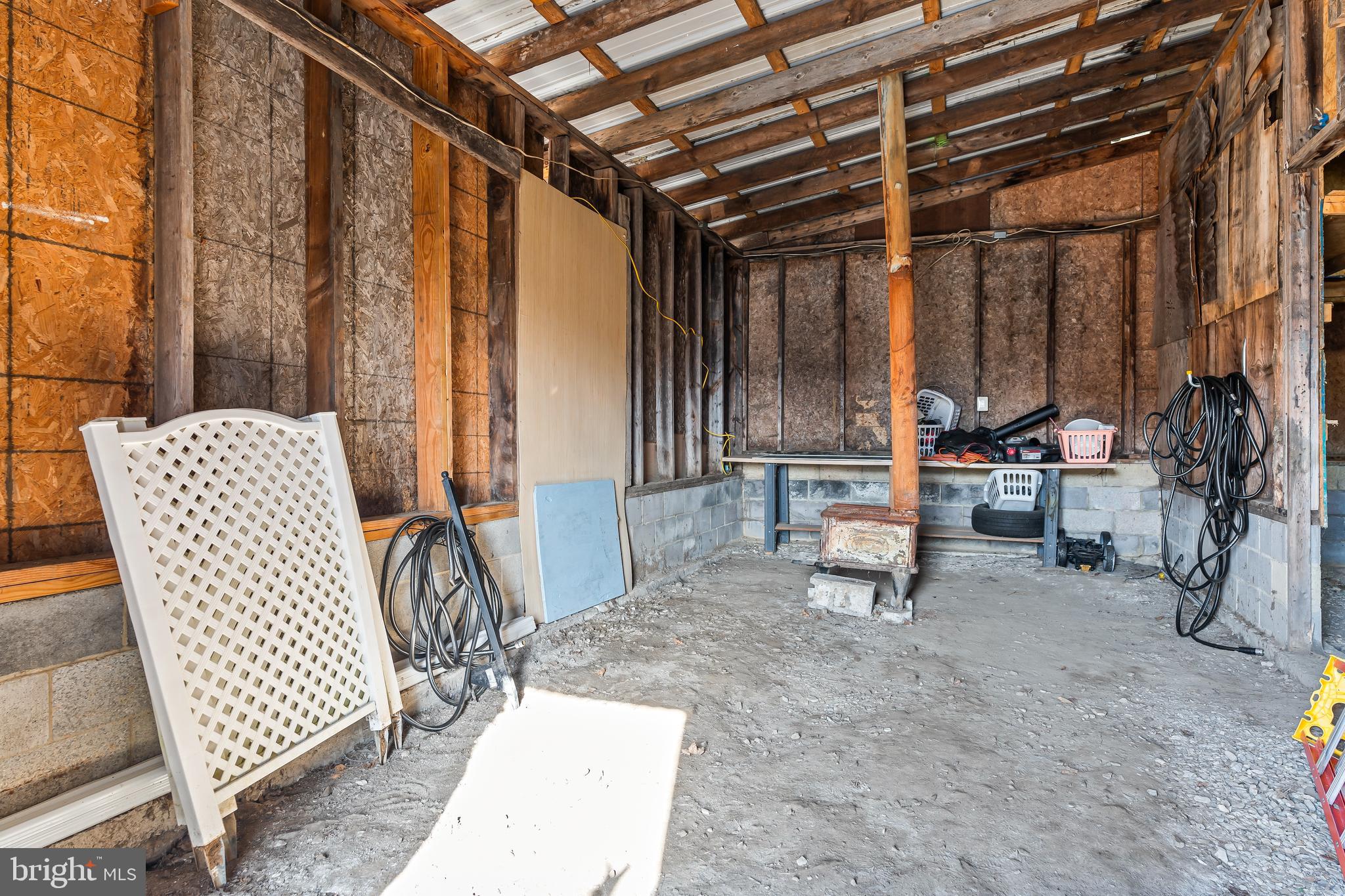 9437 Masters Road Waynesboro, PA 17268 - Photo 37 of 39 a backyard of a house with table and chairs
