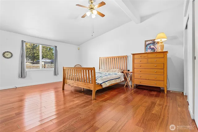 a spacious bathroom with sinks mirror and a bathtub