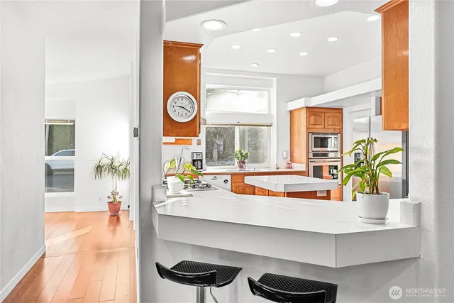 a view of a living room and dining room