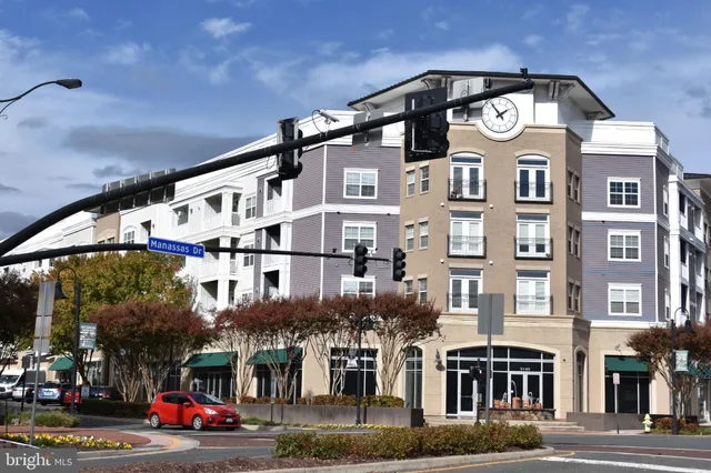 a view of a building with a street