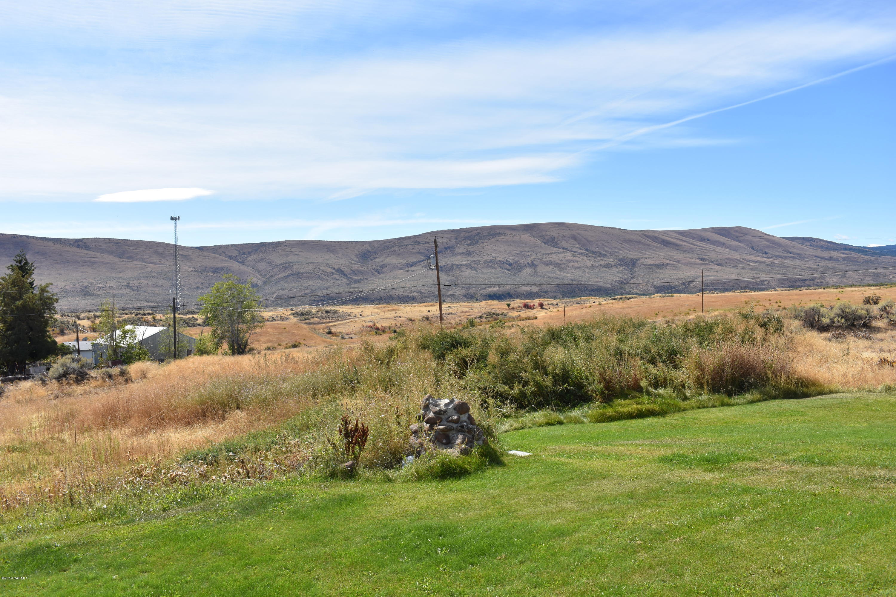 131 Mini Pines Road Yakima, WA 98903 - Photo 19 of 27 a view of a backyard