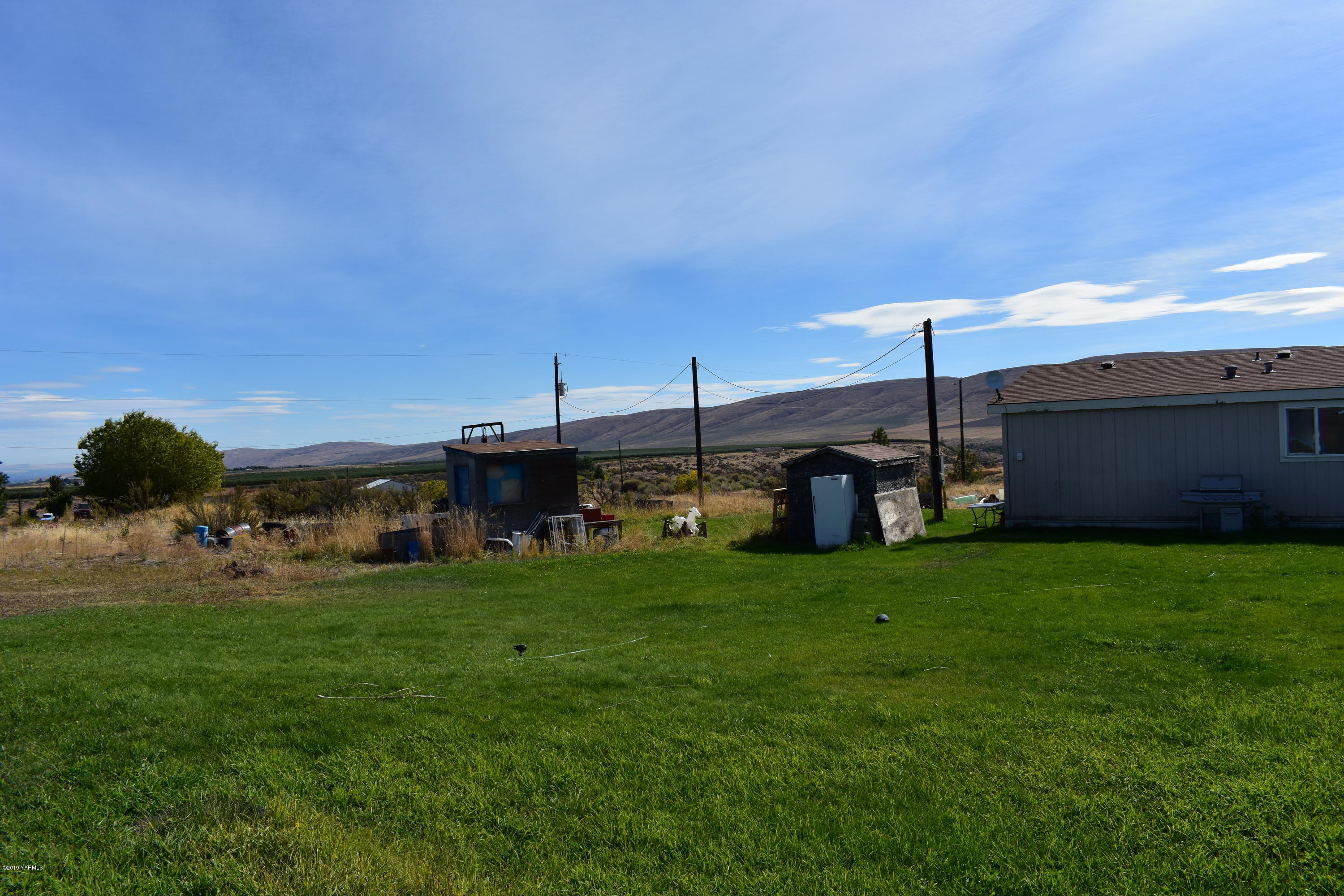 131 Mini Pines Road Yakima, WA 98903 - Photo 8 of 27 a view of a garden