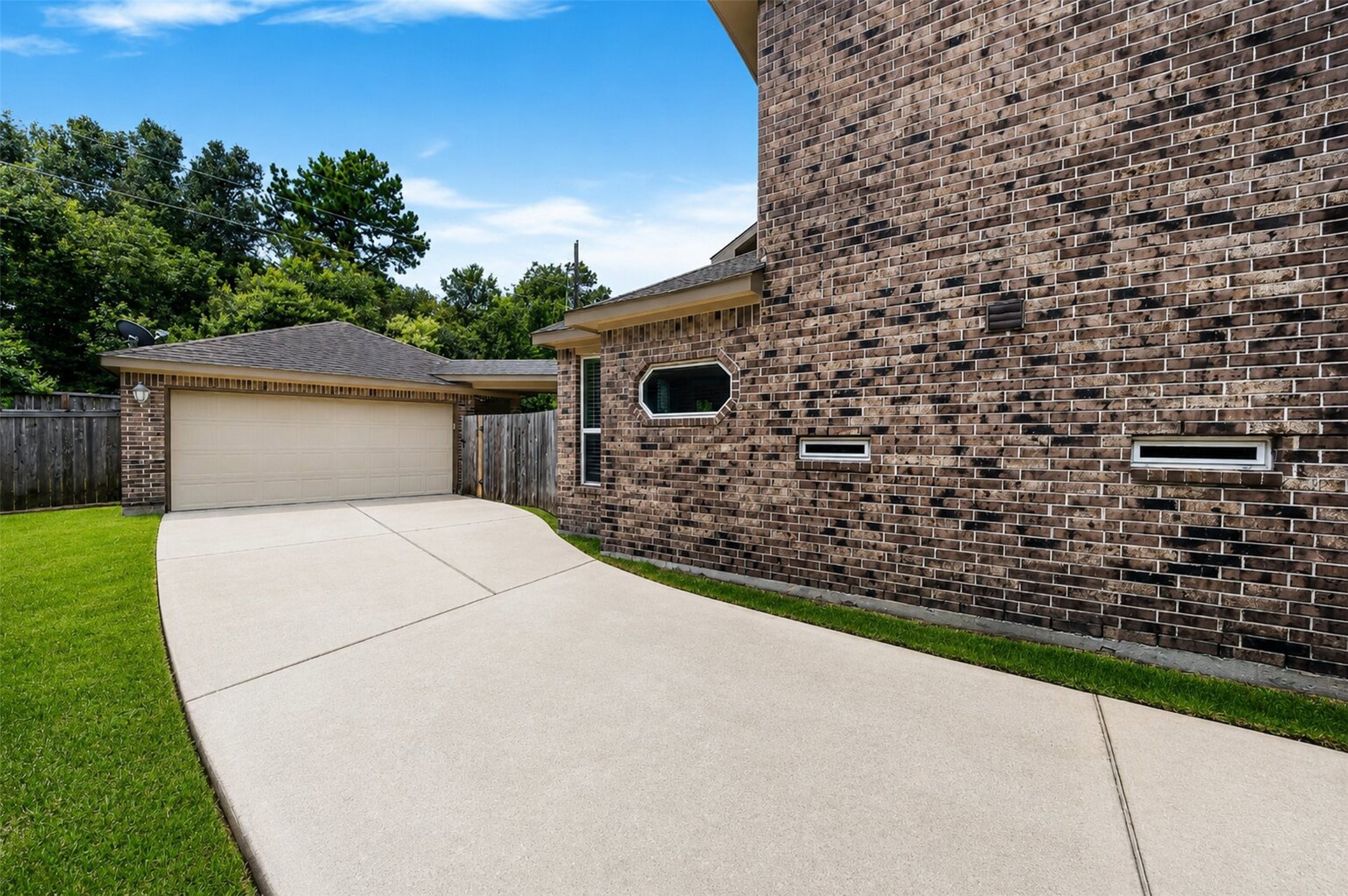 6234 Avon Landing Lane Spring, TX 77379 - Photo 39 of 49 The home has a nice long driveway and offer you family plenty of space to park. The community is tucked away in sought-after gated community of Creekside Farms.