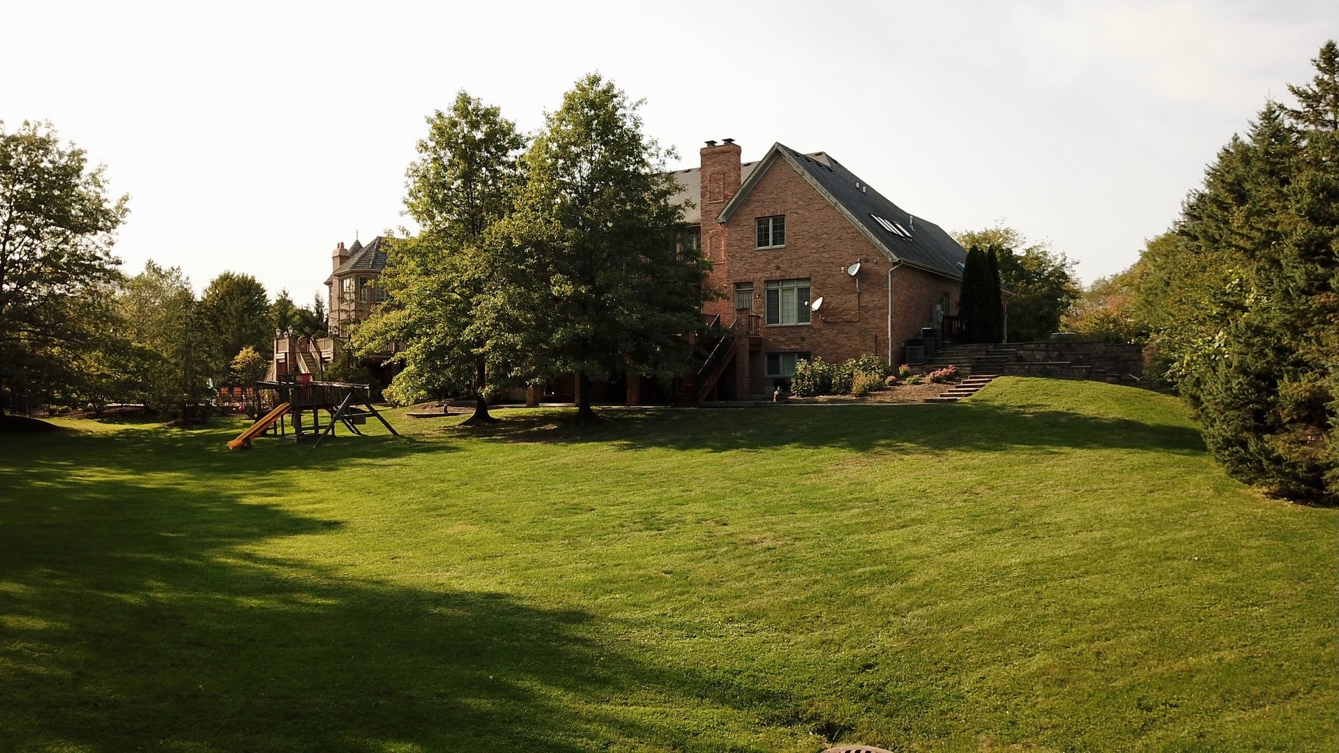 8517 Johnston Road Burr Ridge, IL 60527 - Photo 54 of 62 a house view with swimming pool in front of it