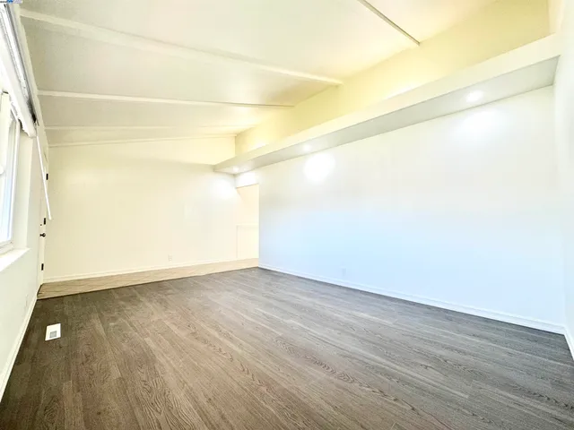 a view of small space with wooden floor