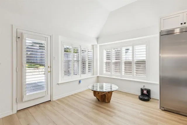 a kitchen with stainless steel appliances a stove sink and cabinets