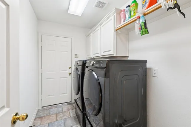 a living room with hard wood flooring