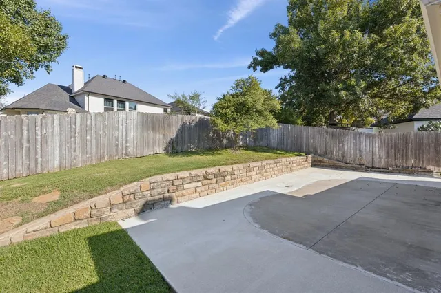 a view of a house with a street