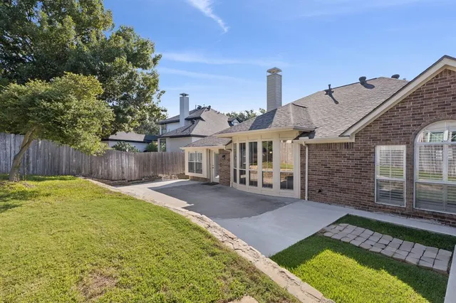 a view of a backyard with a small cabin