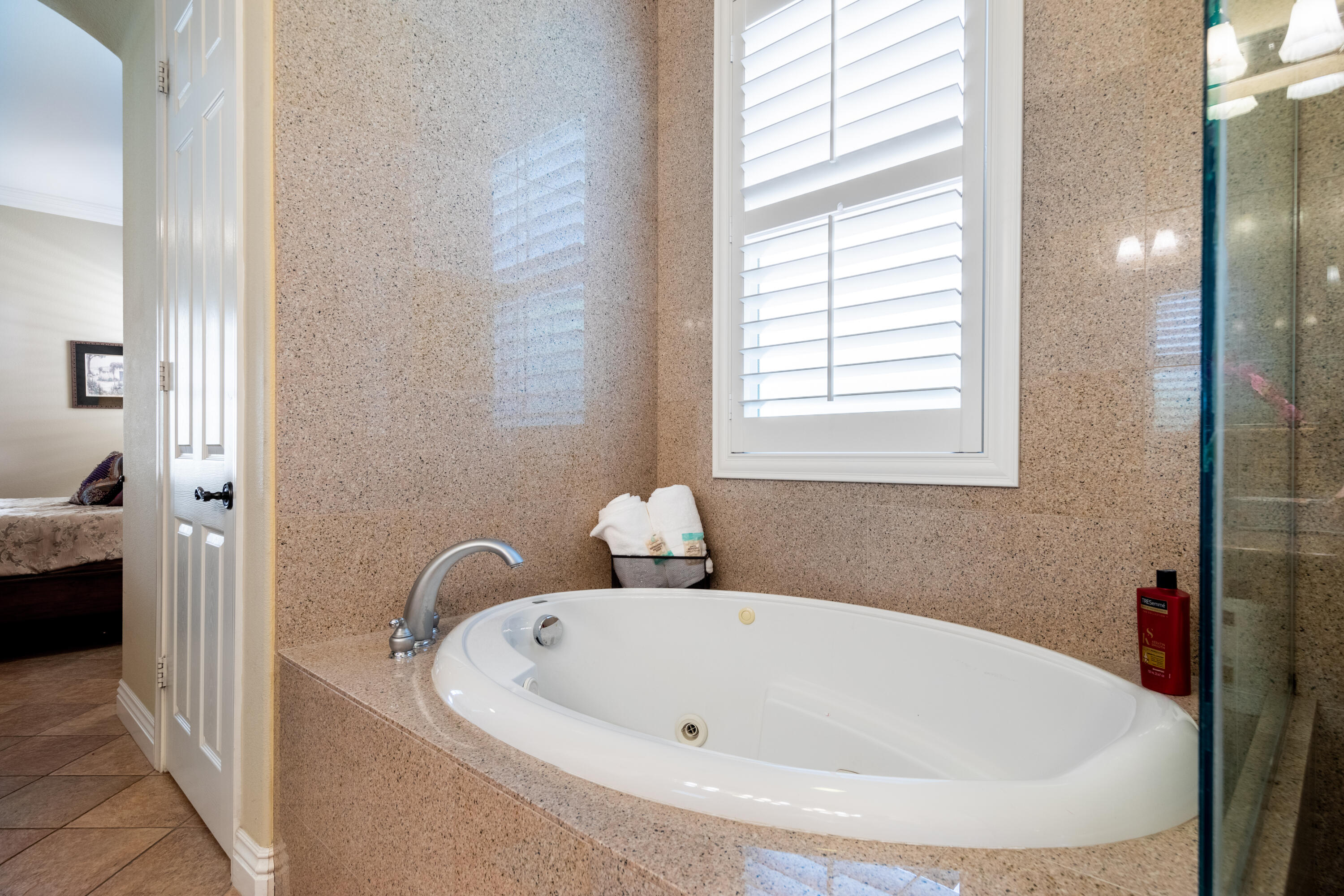 49475 Redford Way Indio, CA 92201 - Photo 18 of 45 a bathroom with a tub and sink