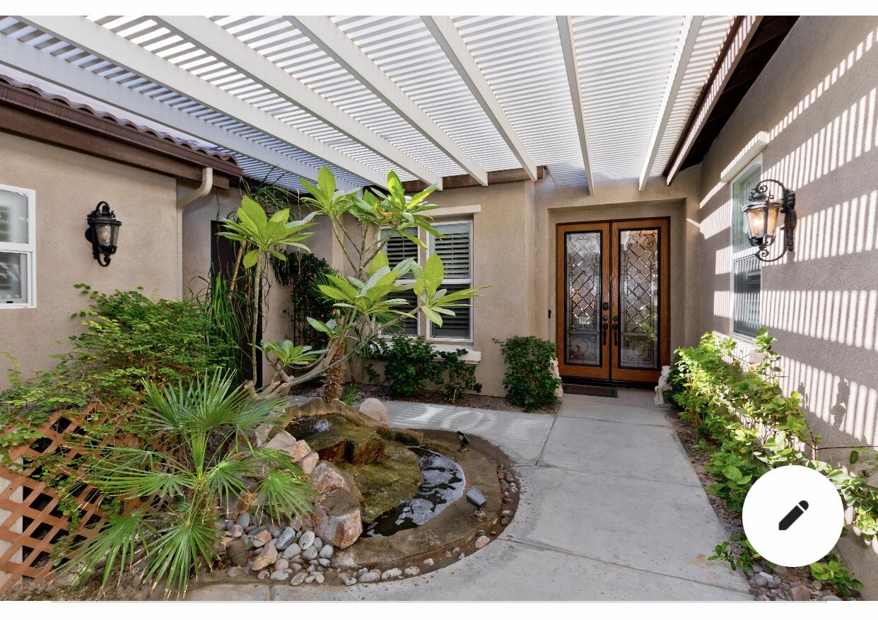 49475 Redford Way Indio, CA 92201 - Photo 3 of 45 a front view of a house