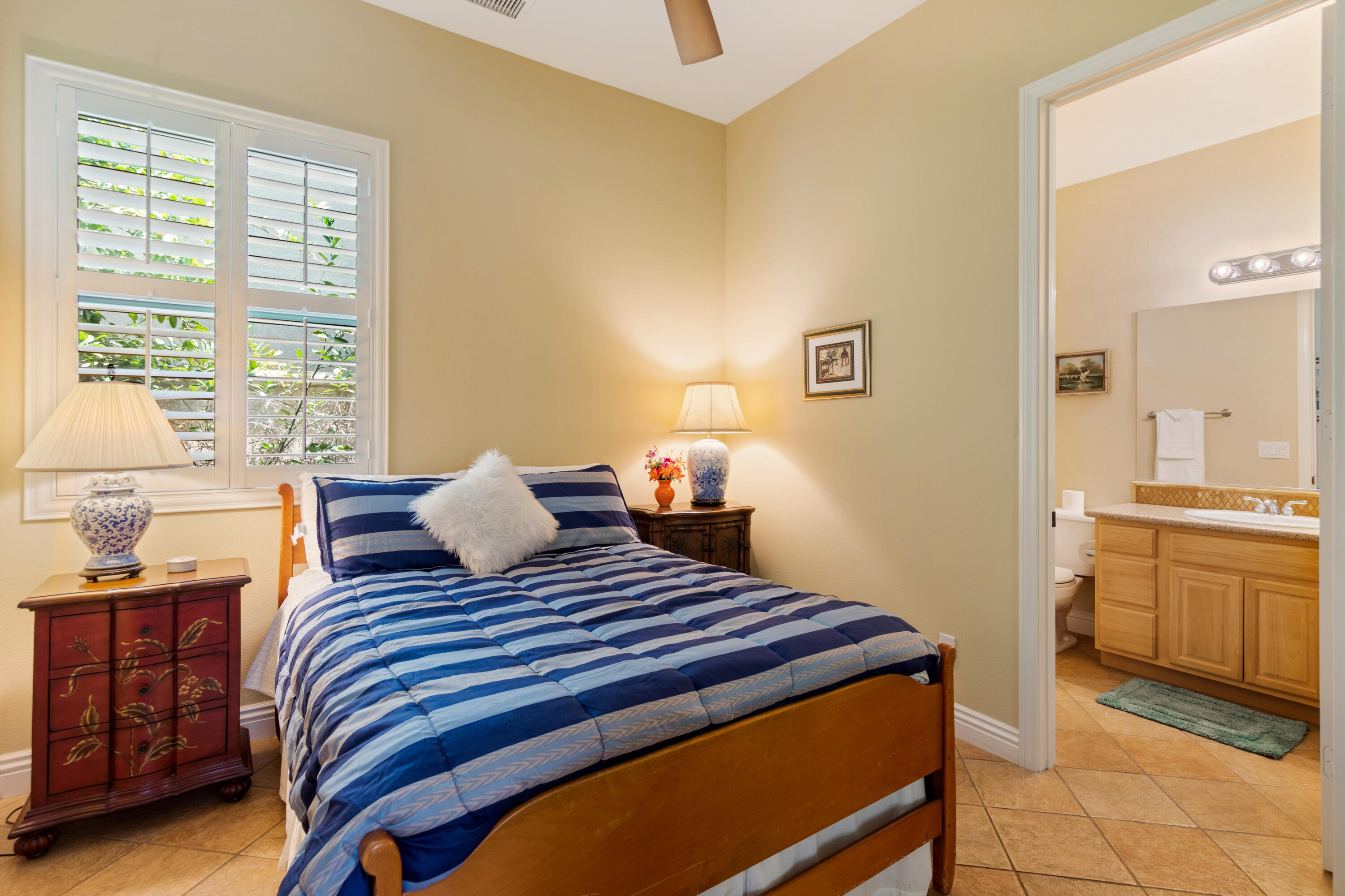 49475 Redford Way Indio, CA 92201 - Photo 41 of 45 a bedroom with a bed and window