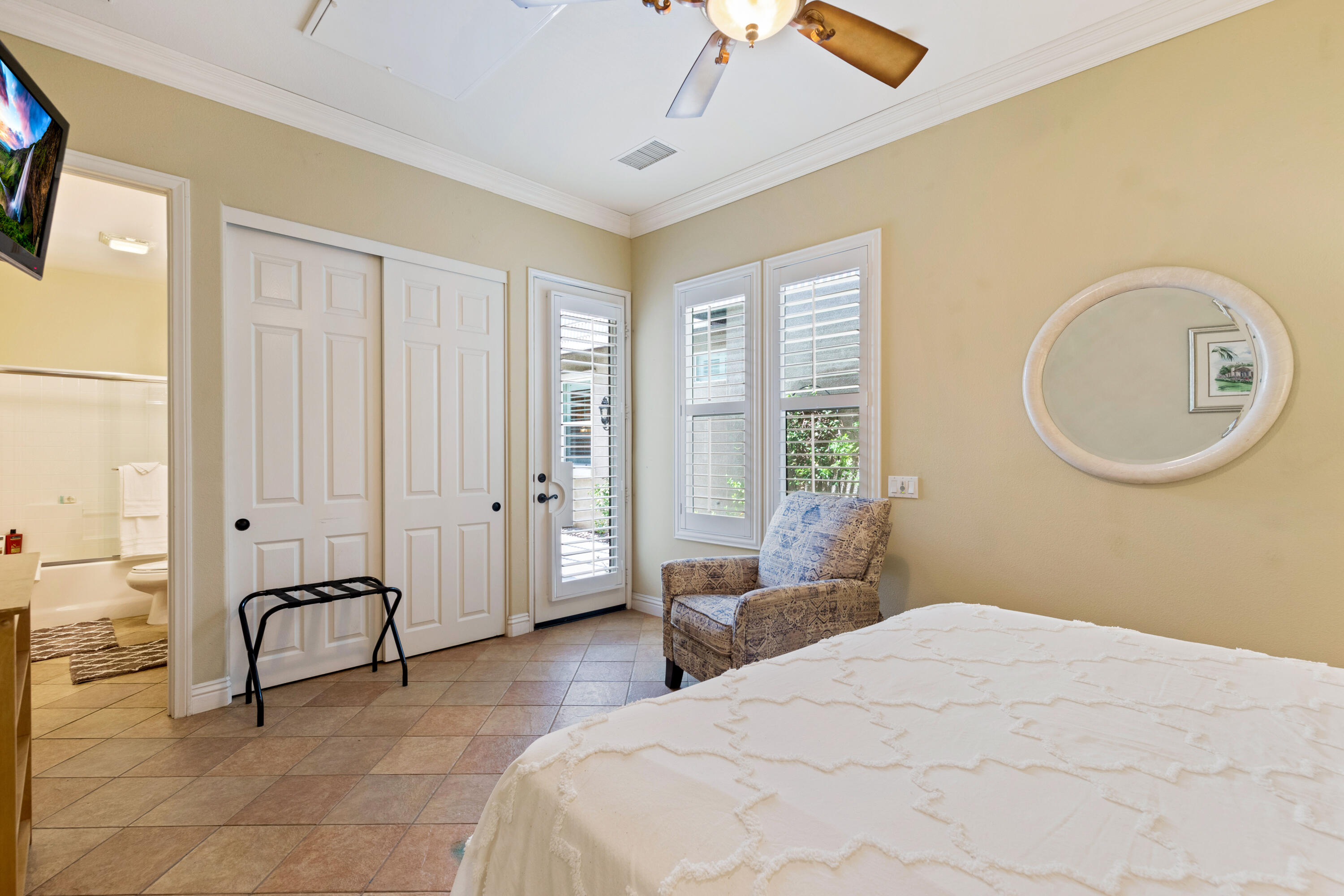 49475 Redford Way Indio, CA 92201 - Photo 44 of 45 a bedroom with a bed and a chandelier