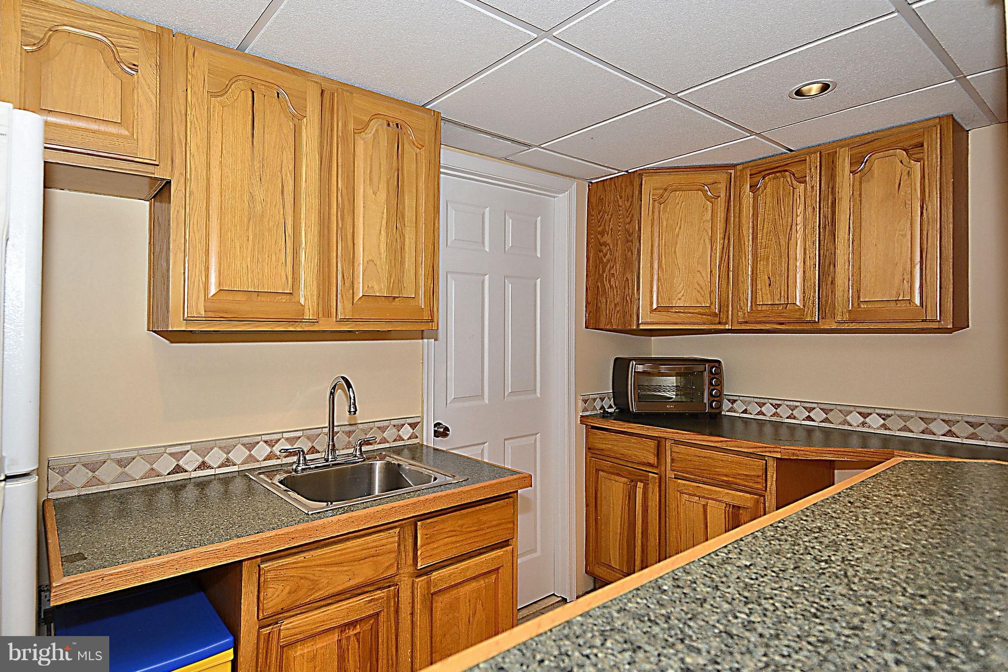 5910 Woodley Road McLean, VA 22101 - Photo 19 of 30 Basement Wet Bar