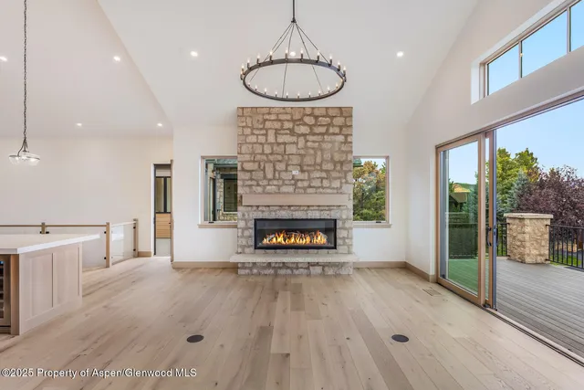 a view of kitchen with sink microwave and refrigerator
