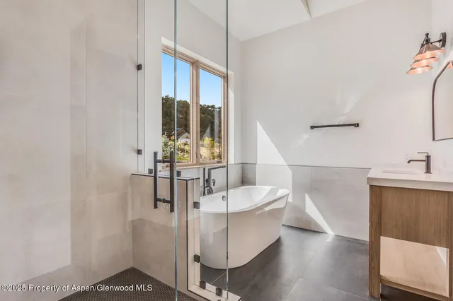 a view of front door with wooden floor