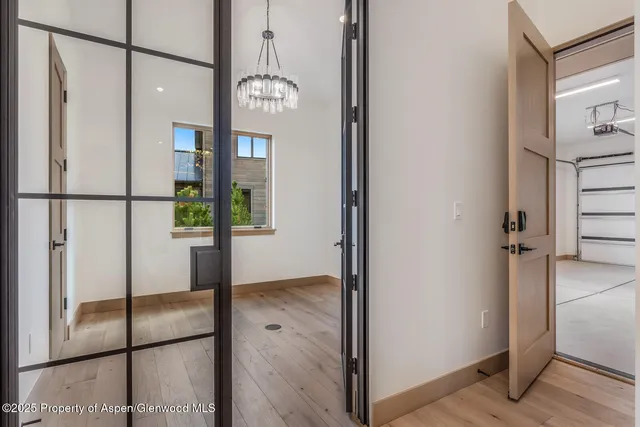 a view of livingroom with hardwood floor and a ceiling fan