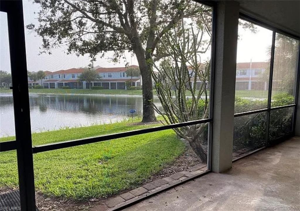14712 Sutherland Avenue Naples, FL 34119 - Photo 2 of 8 a view of a lake view