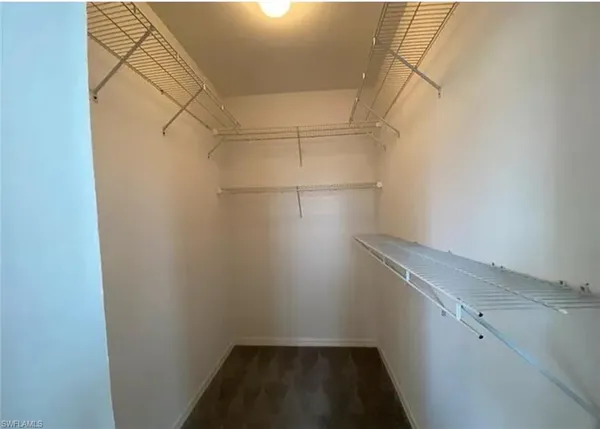 a view of a room with racks on the wall