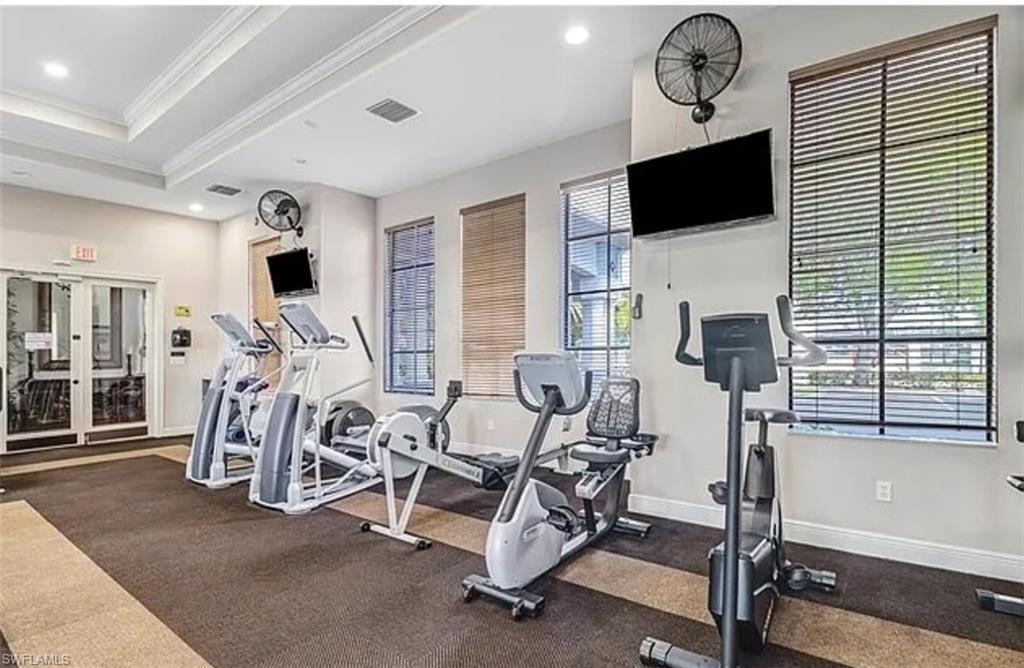 14712 Sutherland Avenue Naples, FL 34119 - Photo 7 of 8 a view of a room with gym equipment