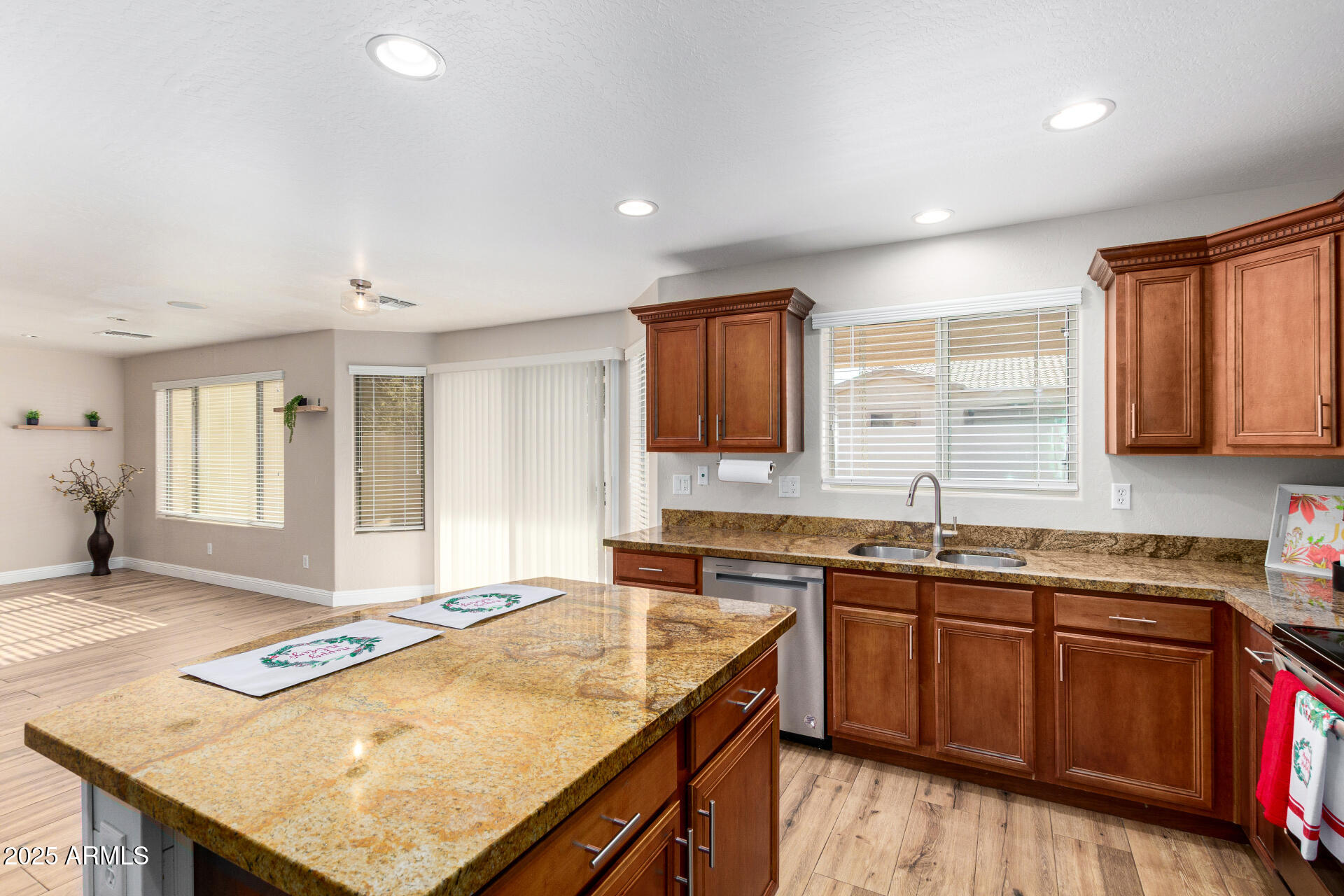 3563 East Blue Ridge Way Gilbert, AZ 85298 - Photo 17 of 48 a kitchen with a sink stove and cabinets