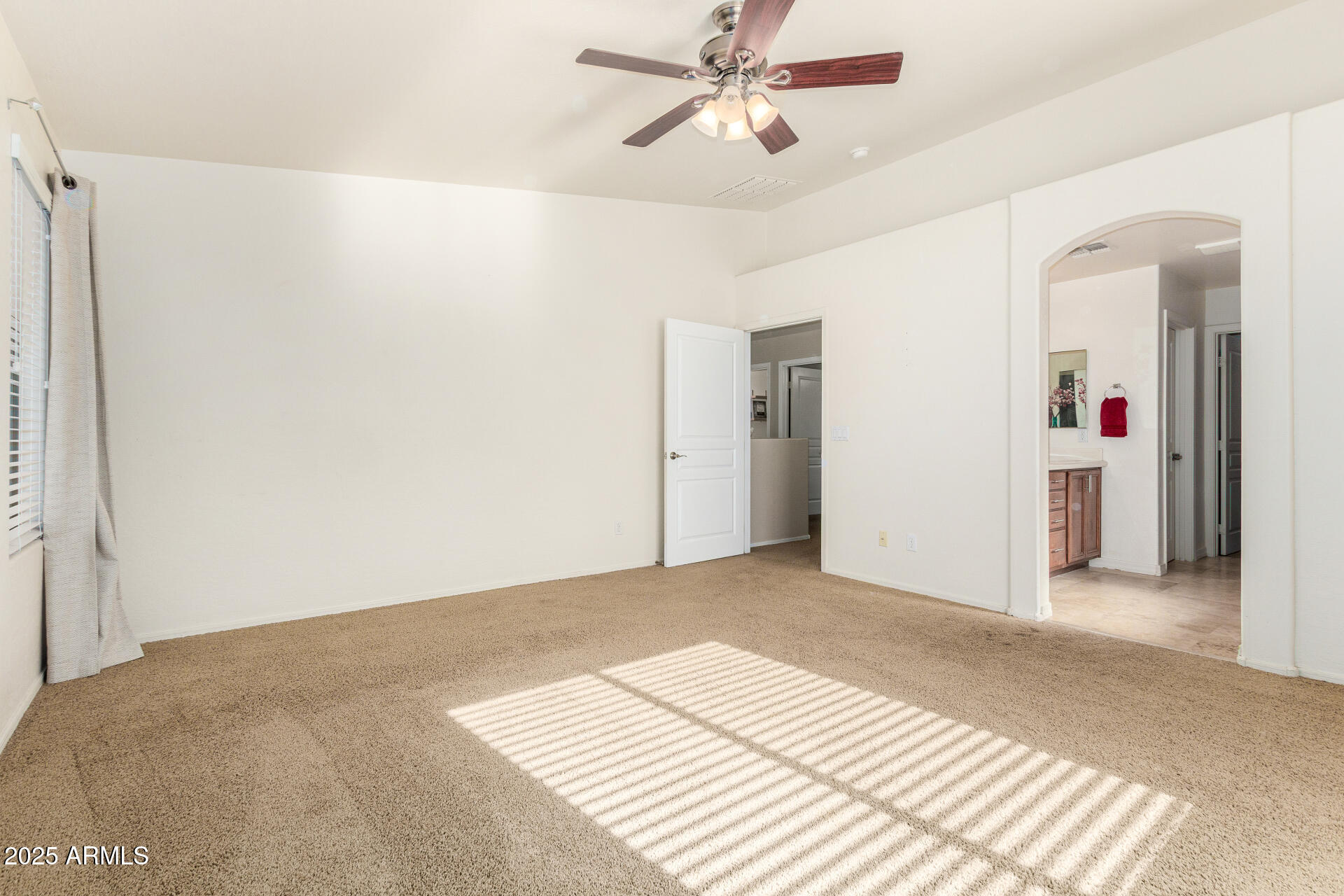 3563 East Blue Ridge Way Gilbert, AZ 85298 - Photo 21 of 48 a view of a room with a ceiling fan