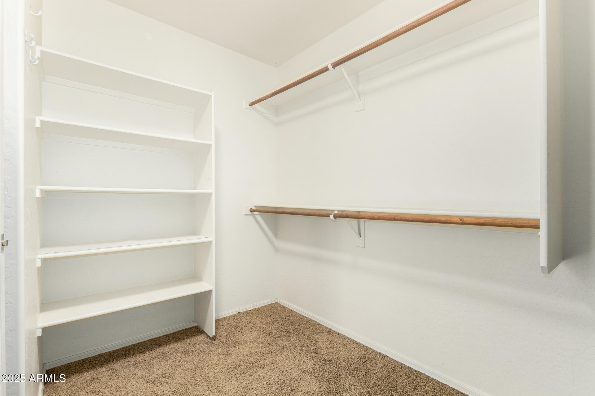 3563 East Blue Ridge Way Gilbert, AZ 85298 - Photo 25 of 48 a view of an empty walk in closet