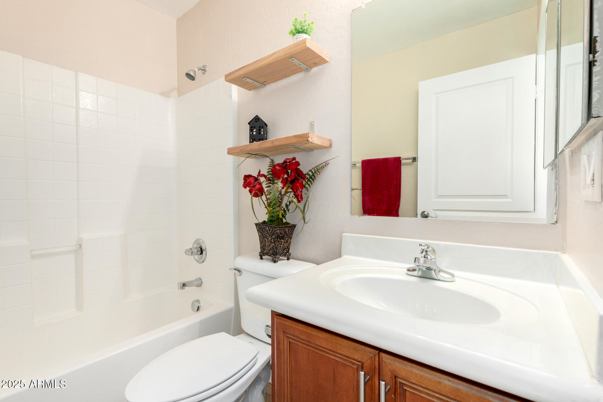 3563 East Blue Ridge Way Gilbert, AZ 85298 - Photo 32 of 48 a bathroom with a sink toilet and shower