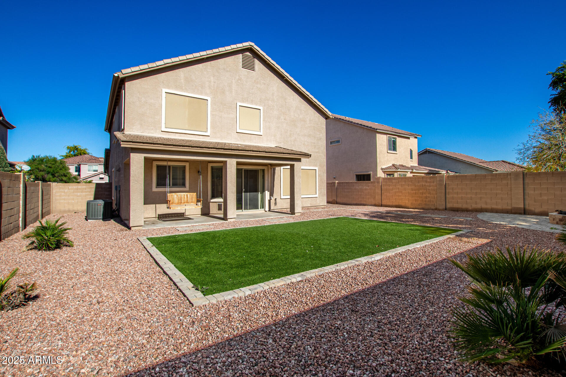 3563 East Blue Ridge Way Gilbert, AZ 85298 - Photo 44 of 48 a front view of a house with a yard