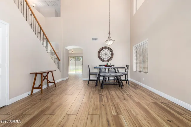 a view of dining room and wooden floor