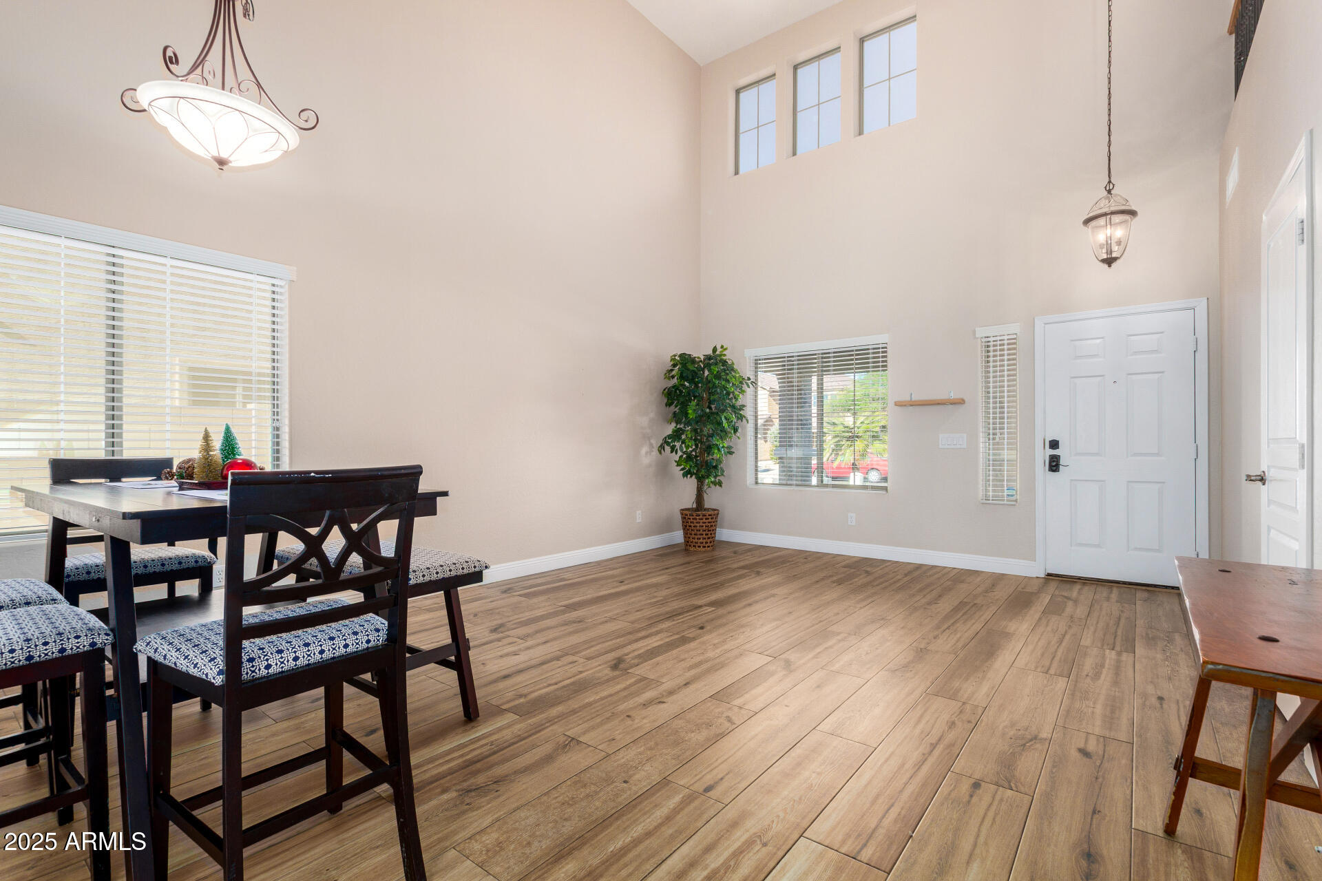 3563 East Blue Ridge Way Gilbert, AZ 85298 - Photo 9 of 48 a view of a dining room with furniture and window