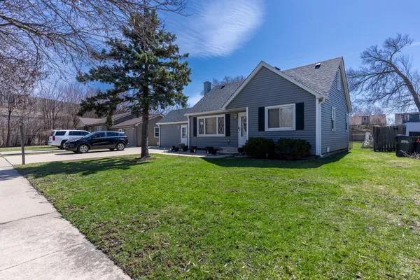 front view of a house with a yard