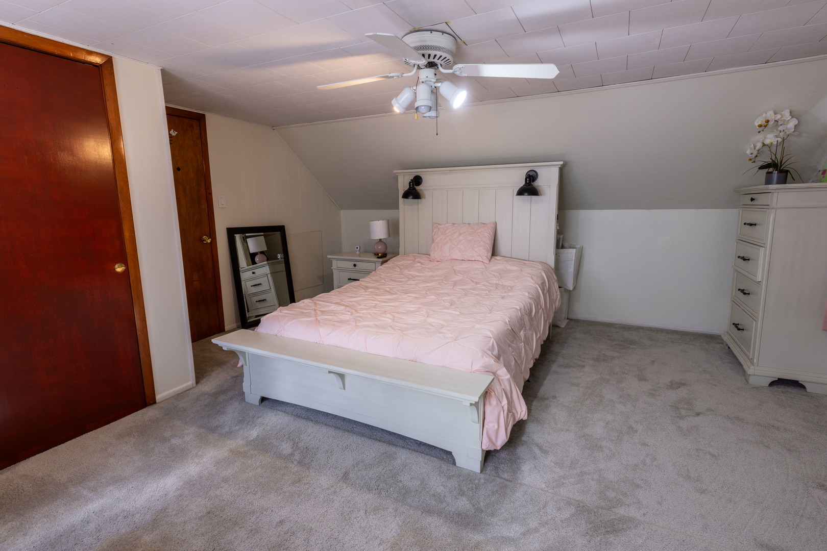 6737 104th Place Chicago Ridge, IL 60415 - Photo 14 of 32 a spacious bedroom with a bed and a chandelier