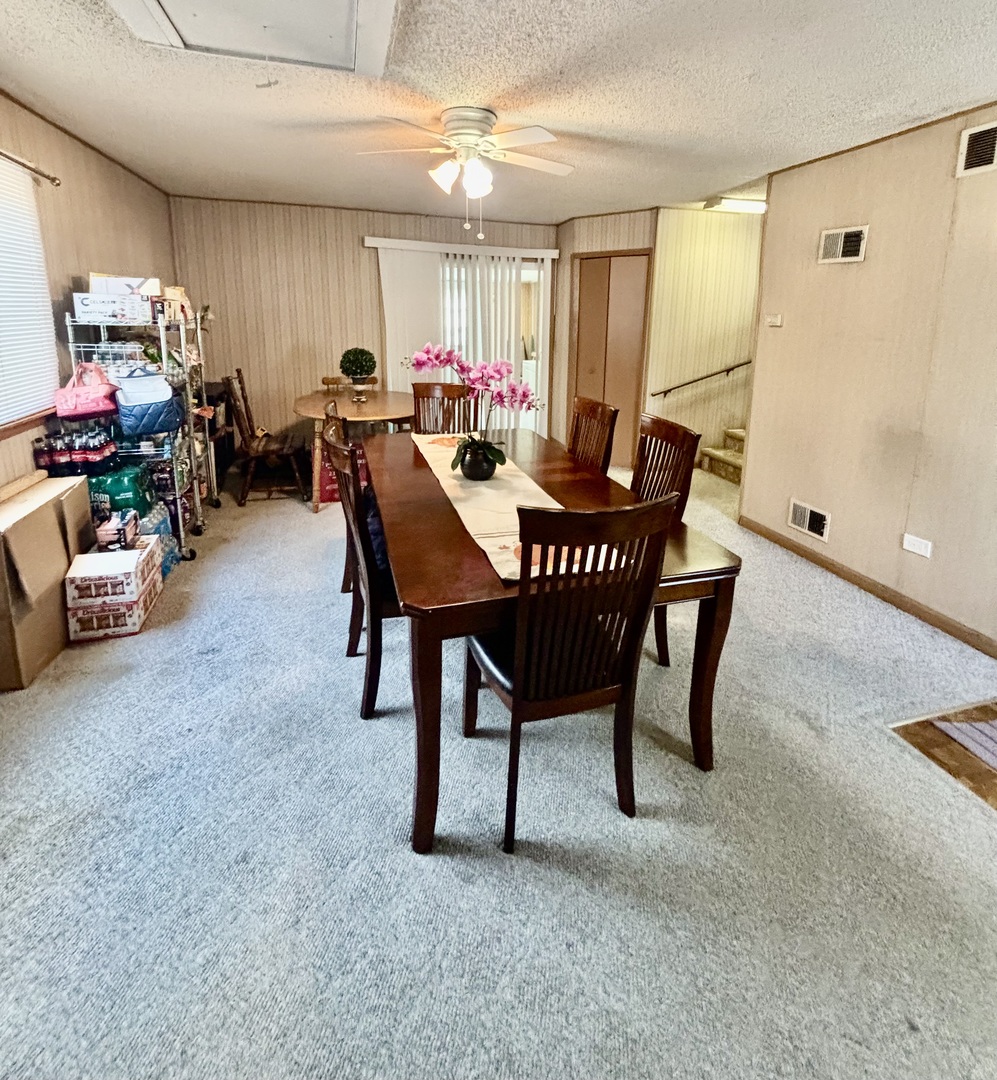 6737 104th Place Chicago Ridge, IL 60415 - Photo 21 of 32 a view of a dining room with furniture