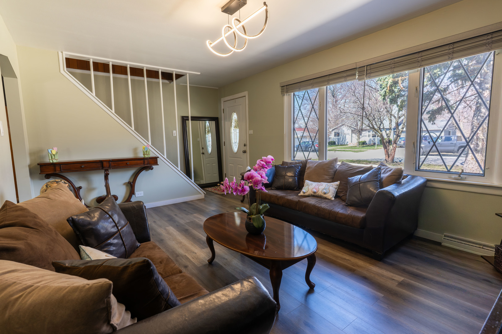6737 104th Place Chicago Ridge, IL 60415 - Photo 9 of 32 a living room with furniture and a large window