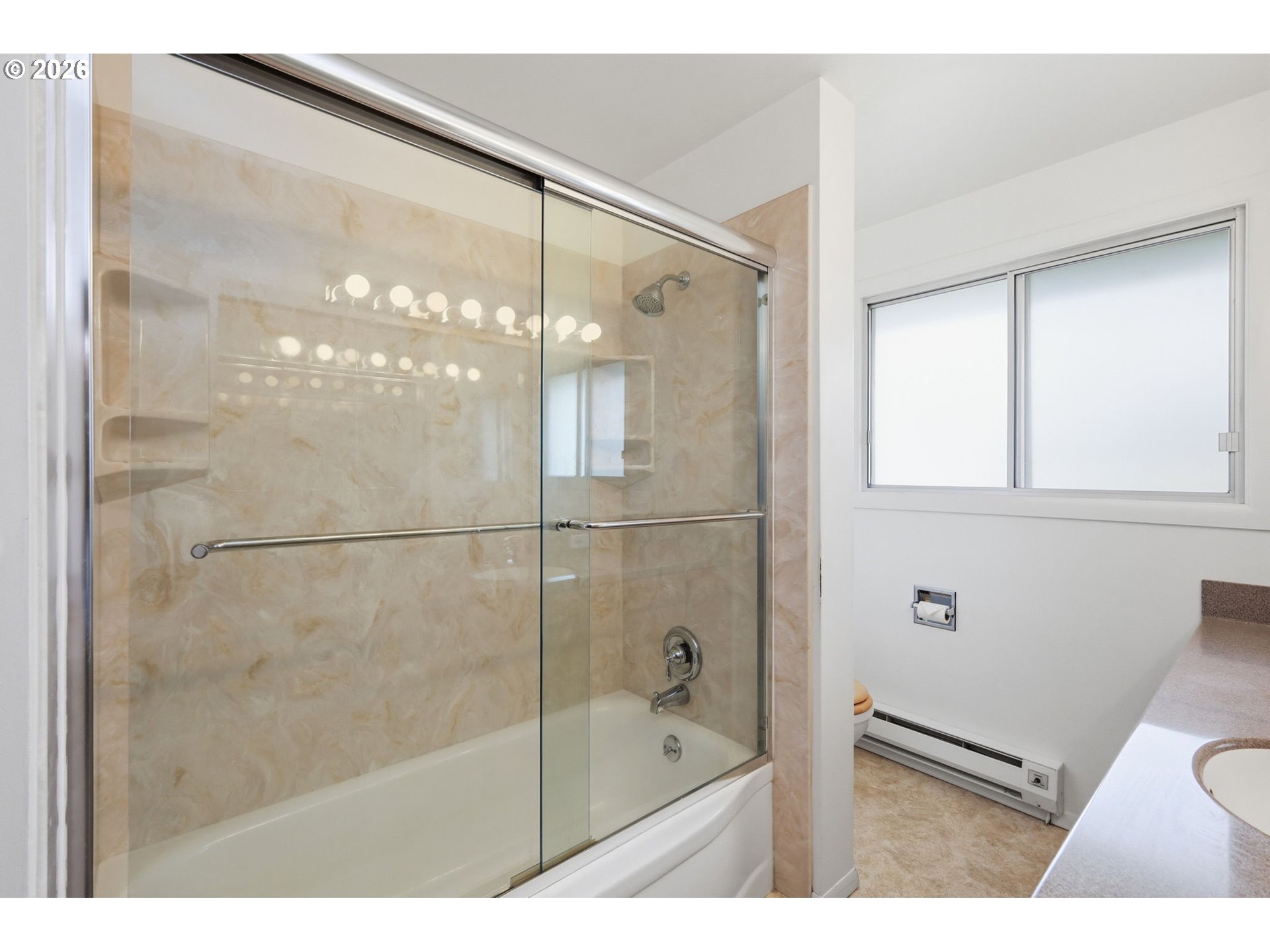 2541 Marcola Road Springfield, OR 97477 - Photo 18 of 33 a bathroom with a glass shower door and a bathtub